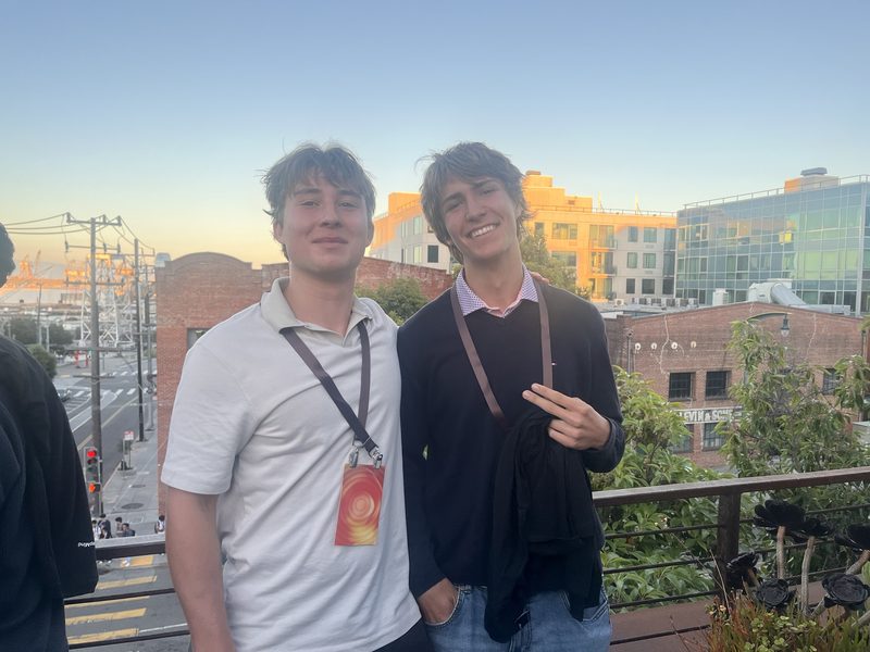 Adrian Erlikhman with another attendee at a DeepMind × Y Combinator event in San Francisco